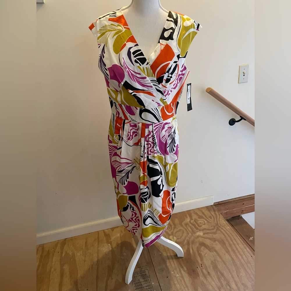 Brand new, Designer dress, size 10, beautiful fabric, fully lined.